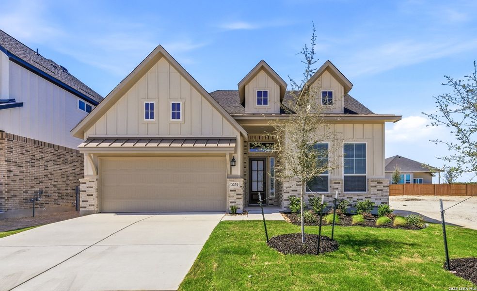 Front exterior of a new home in Prominence Urban, San Antonio, TX, highlighting curb appeal (Image 2). Front exterior of a new home in Prominence Urban, San Antonio, TX, highlighting curb appeal (Image 2).