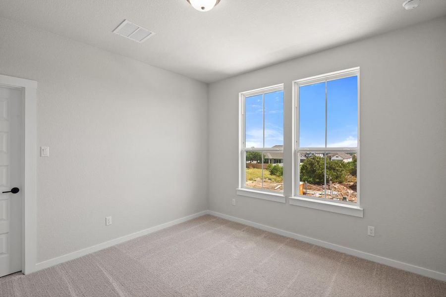Spacious, unfurnished interior of a new home in Wolf Ranch, Georgetown (Image 36).