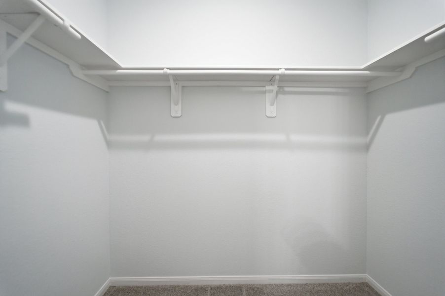 Spacious, unfurnished interior of a new home in The Pines at Seven Coves, Willis (Image 19).
