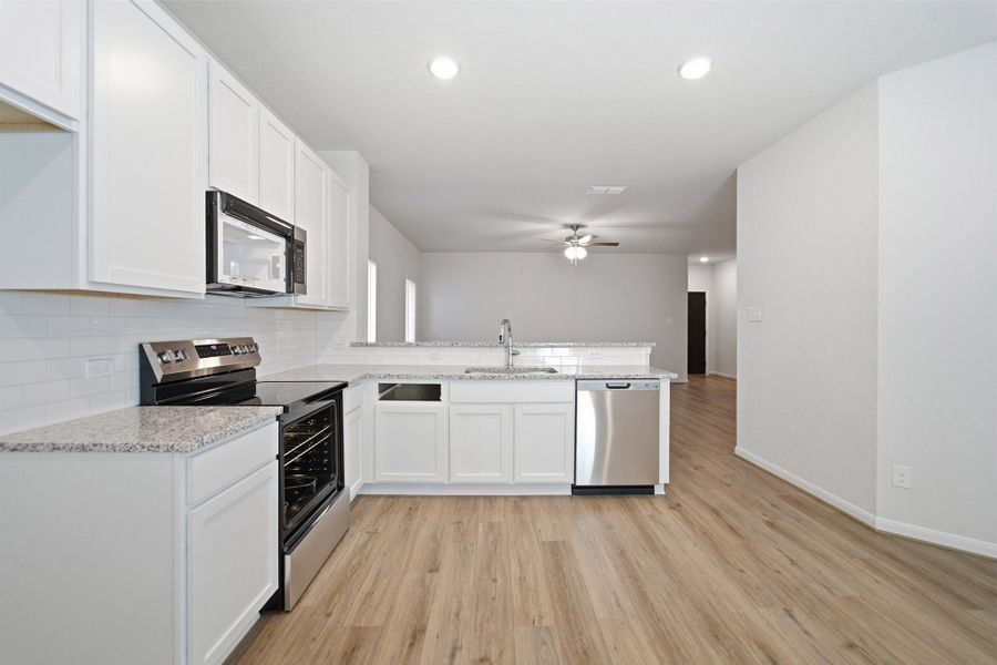 Furnished interior view inside a new home in Notting Hill, Converse (Image 9).