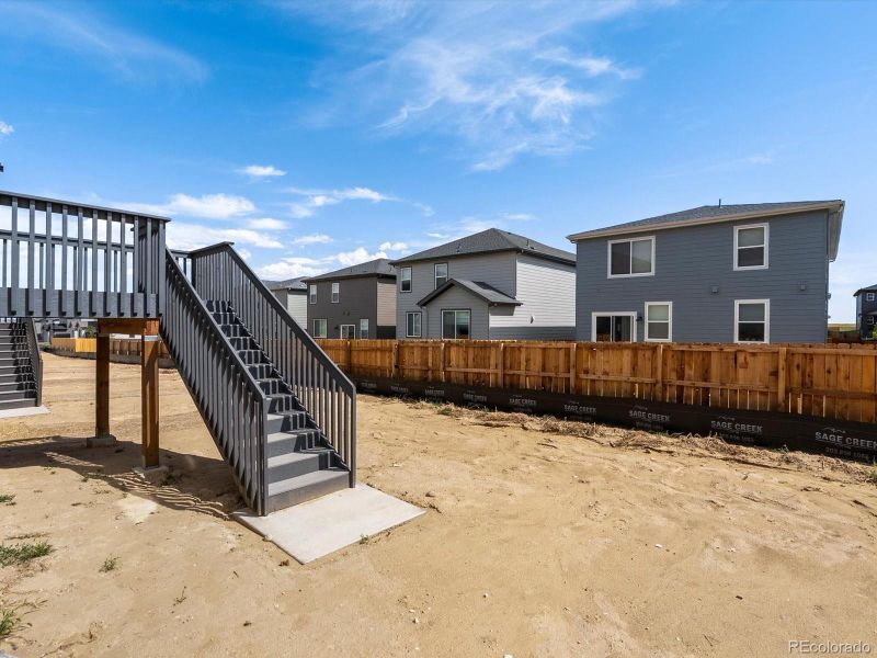 Front exterior of a new home in Lake Bluff, Greeley, CO, highlighting curb appeal (Image 2). Front exterior of a new home in Lake Bluff, Greeley, CO, highlighting curb appeal (Image 2).