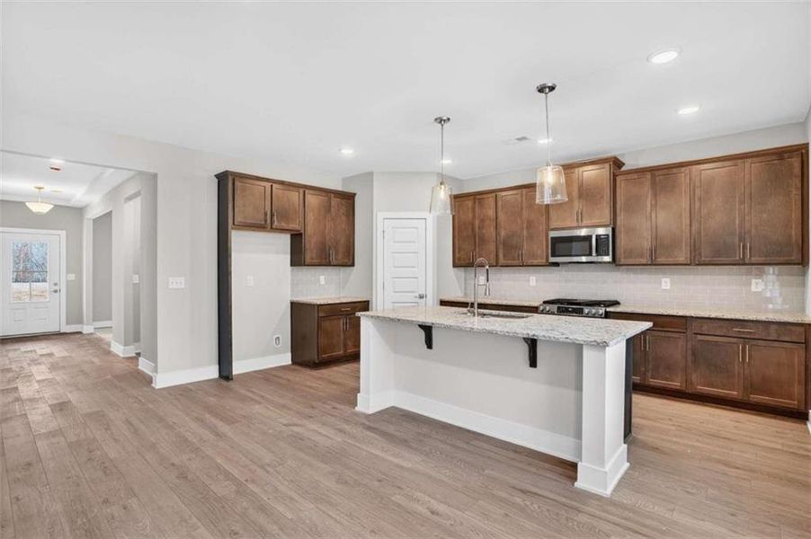 Furnished interior view inside a new home in The Fairways at Mirror Lake, Villa Rica (Image 8).