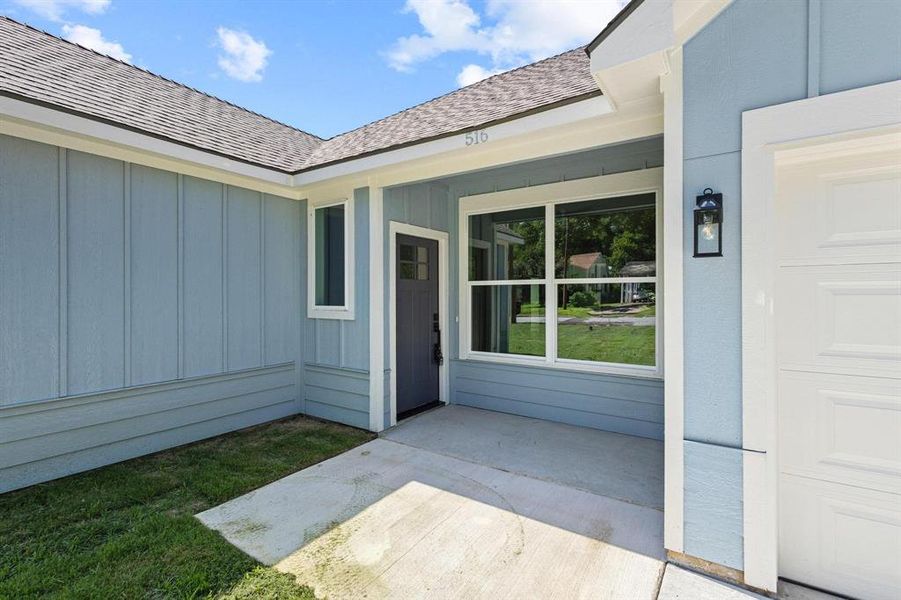 Exterior details and patio area of a home in , Denison (Image 4).