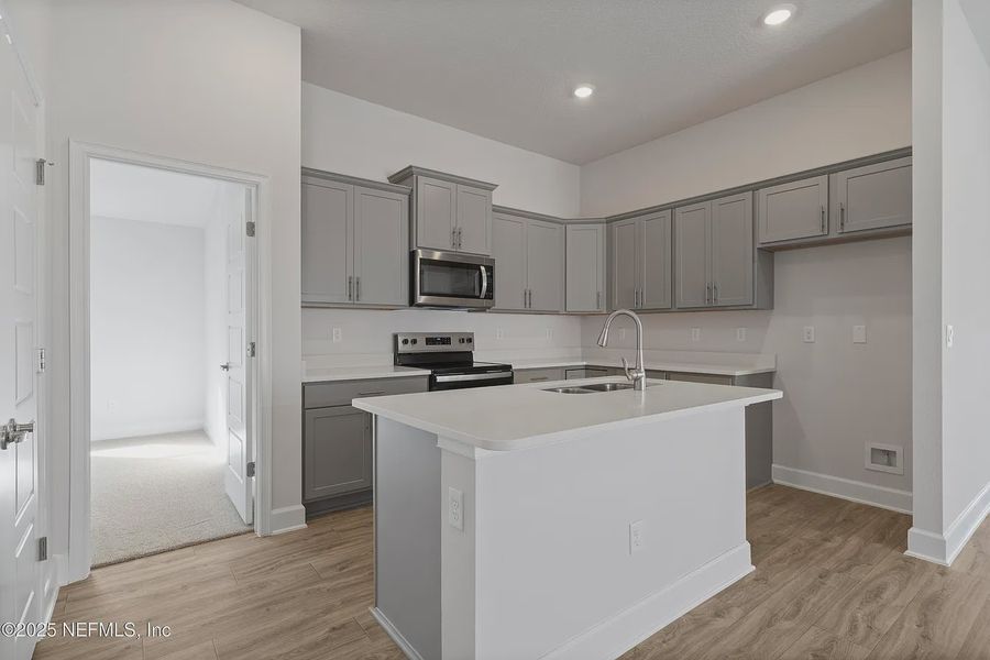 Furnished interior view inside a new home in Shadow Crest at Rolling Hills, Green Cove Springs (Image 6).