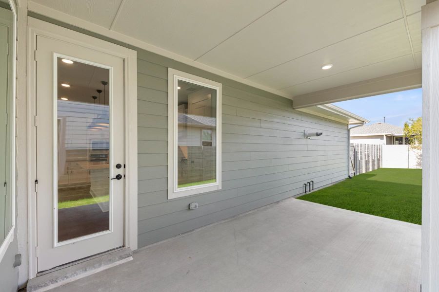 Exterior details and patio area of a home in Painted Tree, McKinney (Image 3).