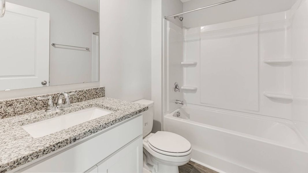 Representative furnished interior of a home built from the HAYDEN by D.R. Horton in Saltgrass Landing, Winnabow (Image 10).