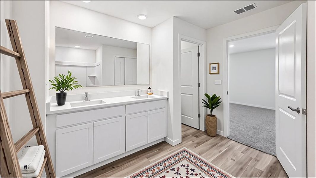 Representative furnished interior of a home built from the ROBIE by D.R. Horton in Oaks Preserve, Gainesville (Image 8).