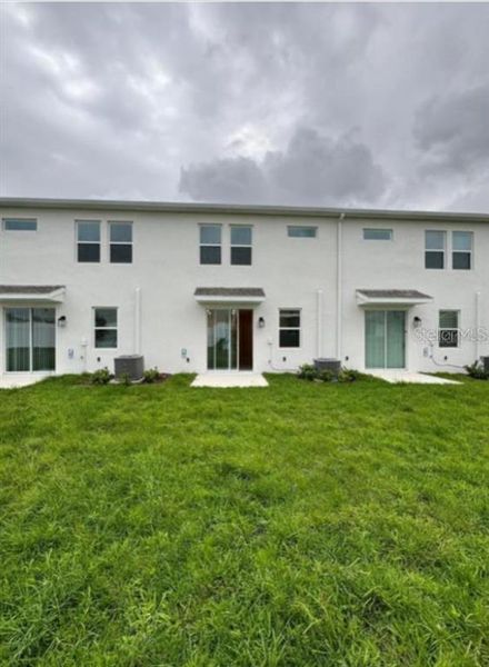 Exterior details and patio area of a home in , Davenport (Image 1).