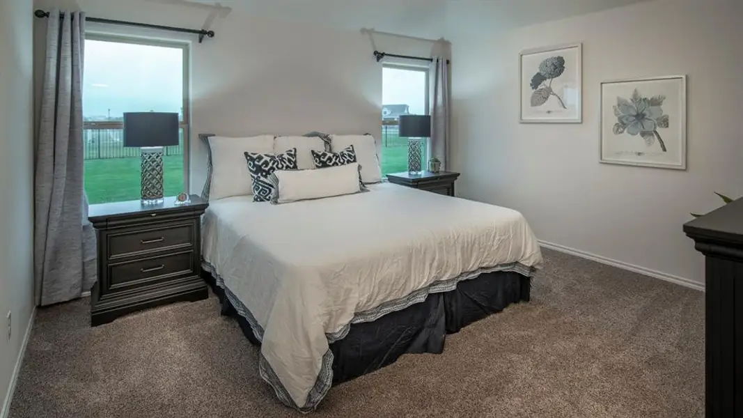 Bedroom with dark carpet
