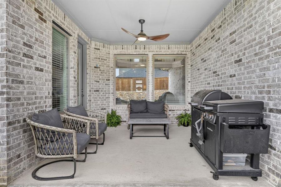 Exterior details and patio area of a home in South Oak, Lakewood Village (Image 3).
