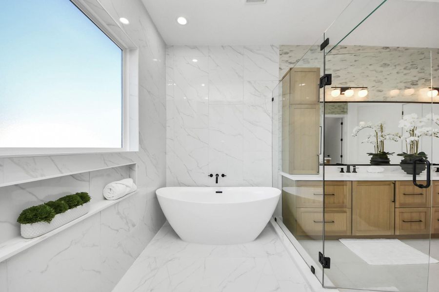 Massive walk-in showers houses the soaking tub.