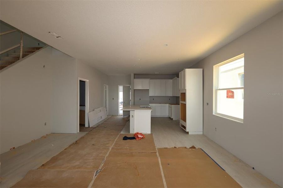 In-progress construction of a new home in Lake Star at Ovation, Winter Garden, FL (Image 11).