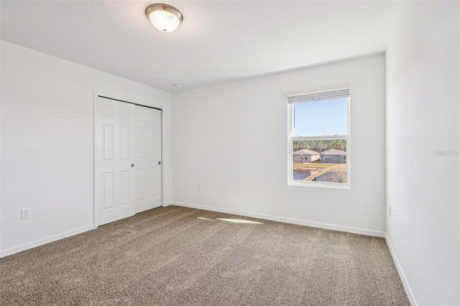 Spacious, unfurnished interior of a new home in Lake Deer Estates - Classic Series, Poinciana (Image 19).