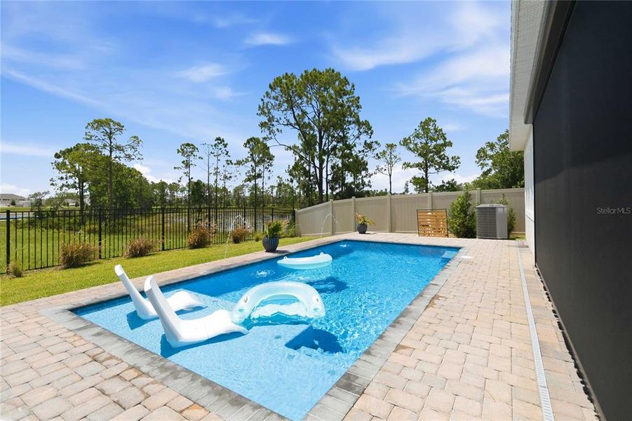 Exterior details and patio area of a home in , Winter Garden (Image 4). Exterior details and patio area of a home in , Winter Garden (Image 4).