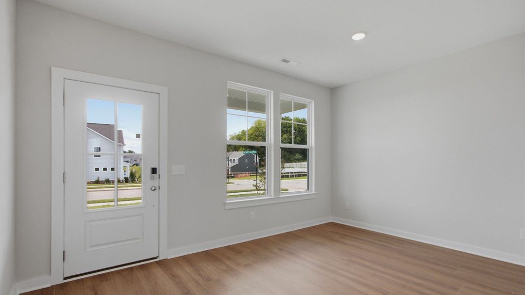 Entryway to home with open flex space