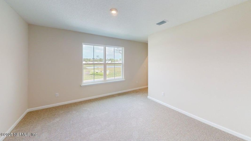 Spacious, unfurnished interior of a new home in Lakes at Bella Lago, Green Cove Springs (Image 16). Spacious, unfurnished interior of a new home in Lakes at Bella Lago, Green Cove Springs (Image 16).