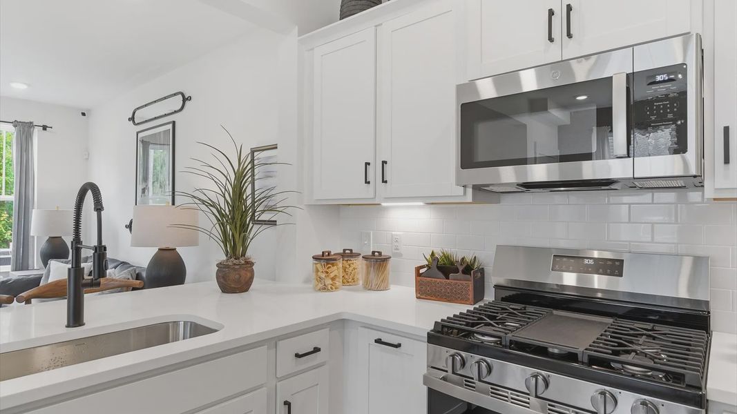 Elegant kitchen with modern finishes in this first-class villa at Clarke Townes near Downtown Anderson, SC