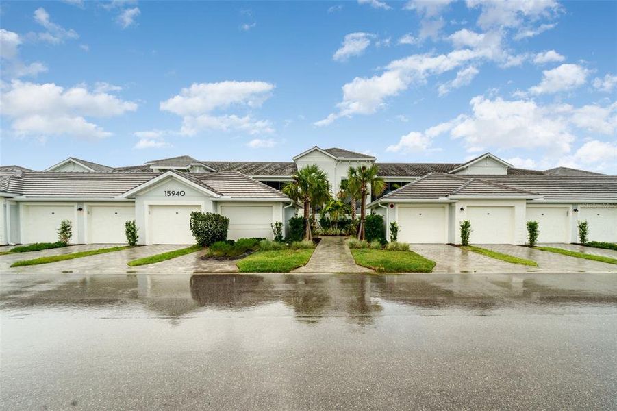 Front exterior of a new home in , Punta Gorda, FL, highlighting curb appeal (Image 24).