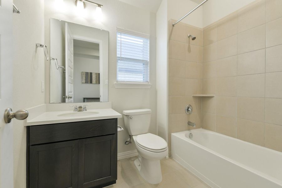 Furnished interior view inside a new home in Oakwood Estates, Waller (Image 7).