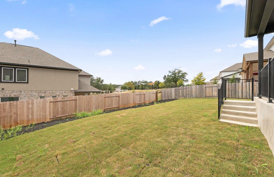 Exterior details and patio area of a home in Bluffview Reserve, Leander (Image 30).