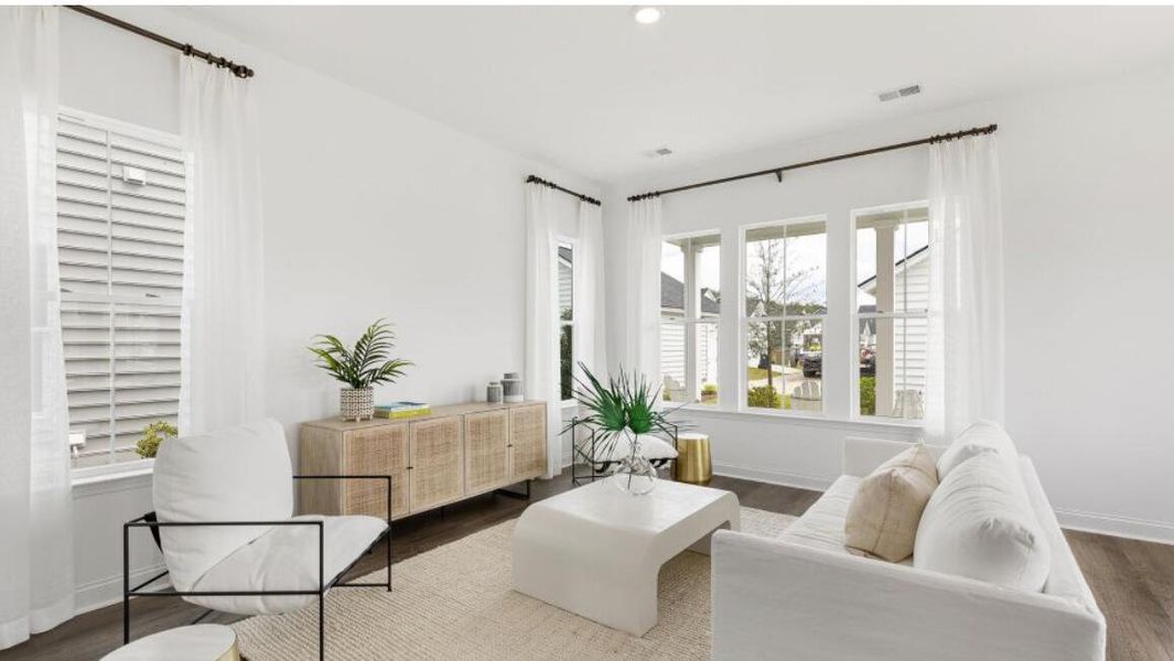 Furnished interior view inside a new home in Carnes Crossroads: Row Collection, Summerville (Image 7). Furnished interior view inside a new home in Carnes Crossroads: Row Collection, Summerville (Image 7).