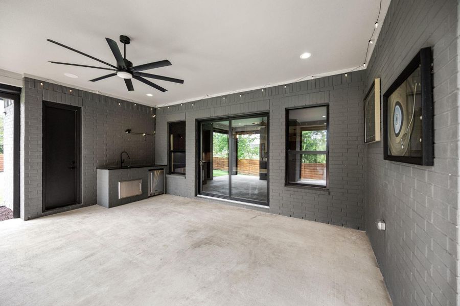 outdoor living space has a fireplace, retractable screens by remote, sink, refrigerator, and half bath, perfect for entertaining! outdoor living space has a fireplace, retractable screens by remote, sink, refrigerator, and half bath, perfect for entertaining!