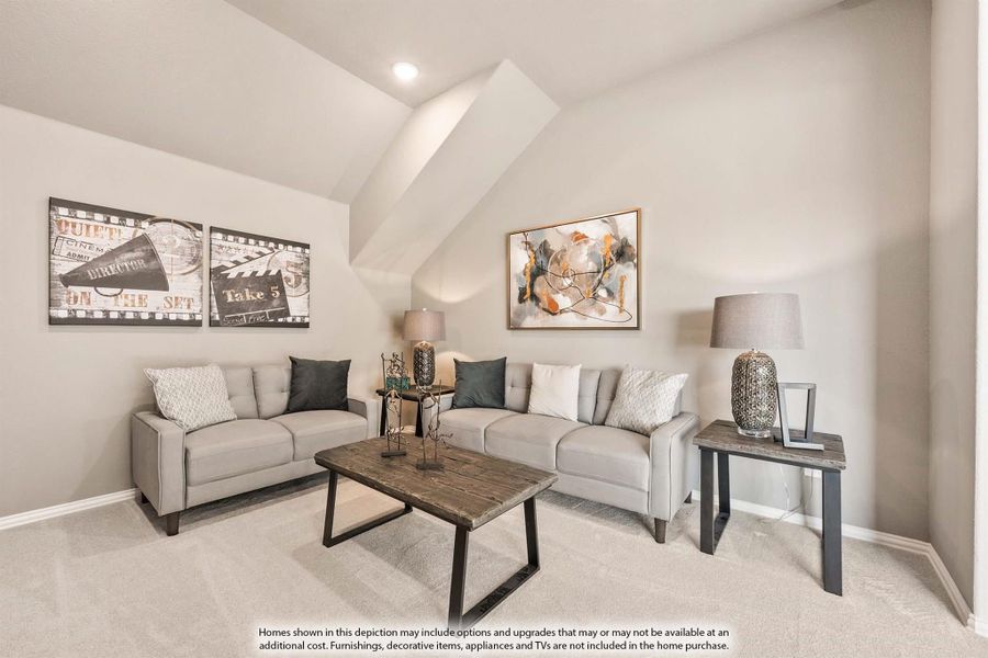 Living room with vaulted ceiling, two gray sofas, wood coffee table, and carpet flooring