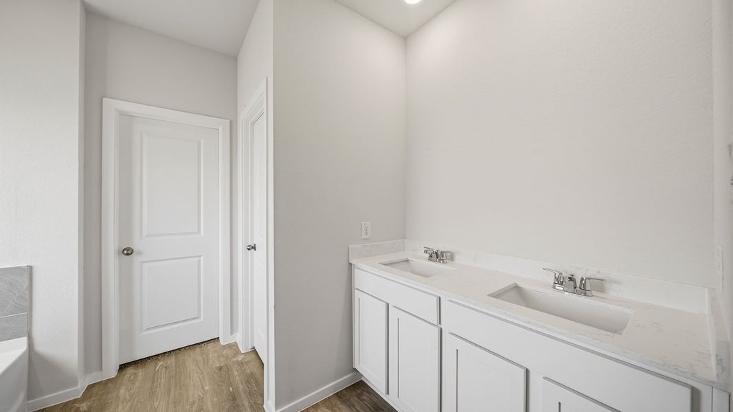 Furnished interior view inside a new home in Sunterra Lakes, Brookshire (Image 8).