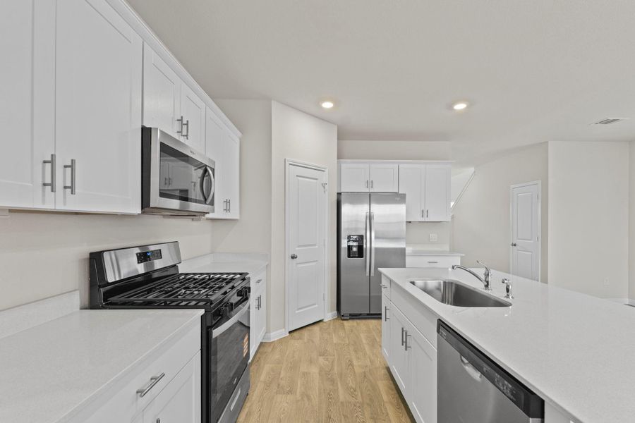 Furnished interior view inside a new home in Whisper South, San Marcos (Image 5).