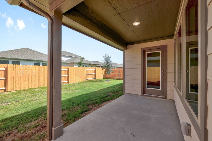 Exterior details and patio area of a home in Prairie Winds, Hutto (Image 3).