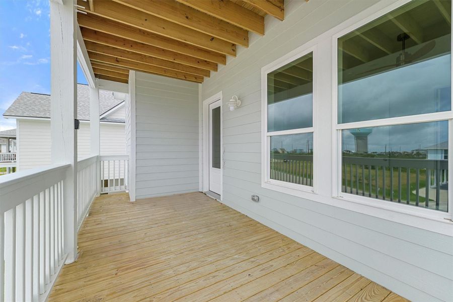 Step onto the welcoming front balcony and enter through the main door, where coastal charm and elevated views greet you right away. Step onto the welcoming front balcony and enter through the main door, where coastal charm and elevated views greet you right away.