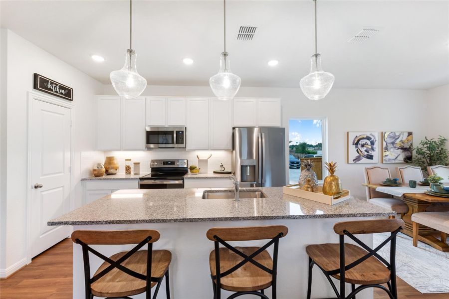 Furnished interior view inside a new home in Sweetgrass Village, Crosby (Image 4).