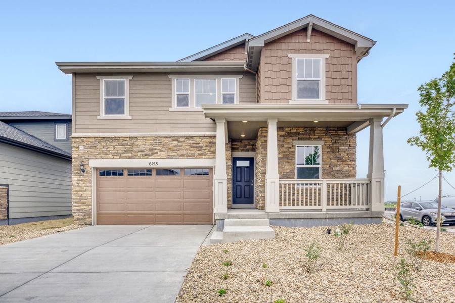 Front exterior of a new home in Kinston, Loveland, CO, highlighting curb appeal (Image 1). Front exterior of a new home in Kinston, Loveland, CO, highlighting curb appeal (Image 1).