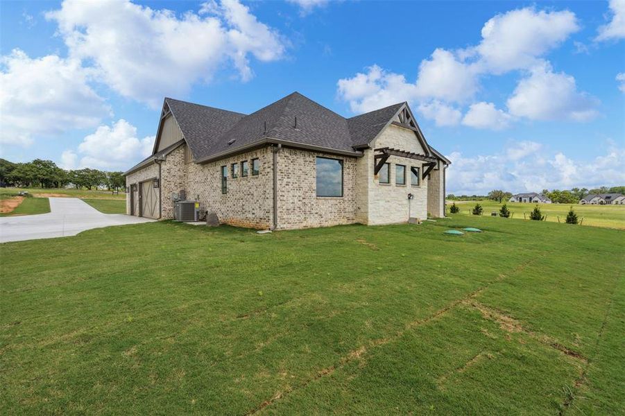 Front exterior of a new home in , Weatherford, TX, highlighting curb appeal (Image 24). Front exterior of a new home in , Weatherford, TX, highlighting curb appeal (Image 24).