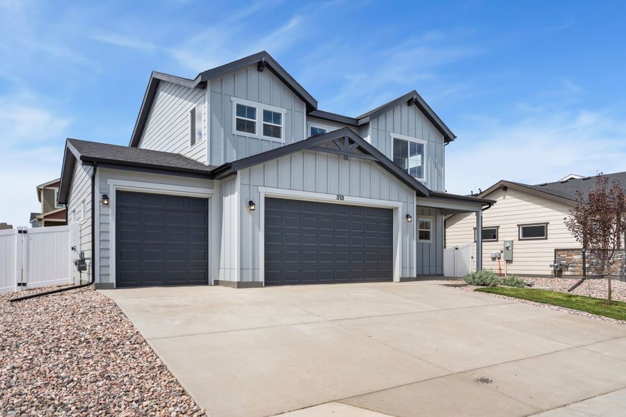 Front exterior of a new home in Union Colony West, Greeley, CO, highlighting curb appeal (Image 17).