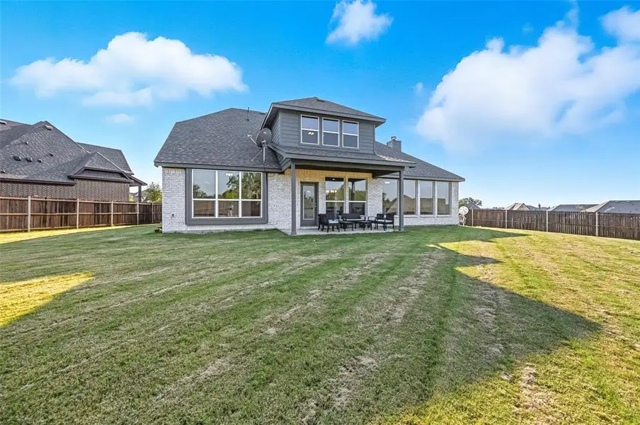 Exterior details and patio area of a home in Villages of Walnut Grove, Midlothian (Image 3).