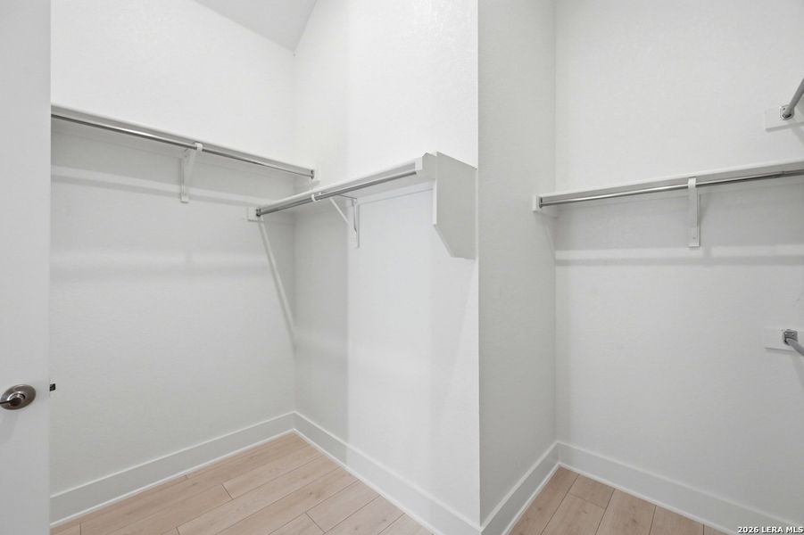 Spacious, unfurnished interior of a new home in Weston Oaks, San Antonio (Image 13).