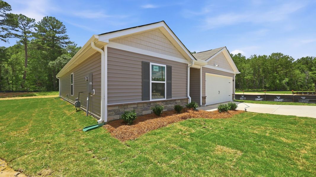 Representative exterior details of a home built from the Freeport II - Express by D.R. Horton in Jetstream Park, Wilson (Image 4).
