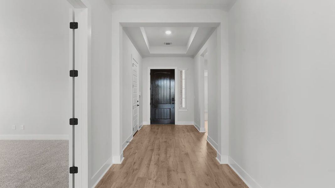 Representative unfurnished interior of a home built from the Mariah by Chesmar Homes in Newhaven, Manor (Image 10).