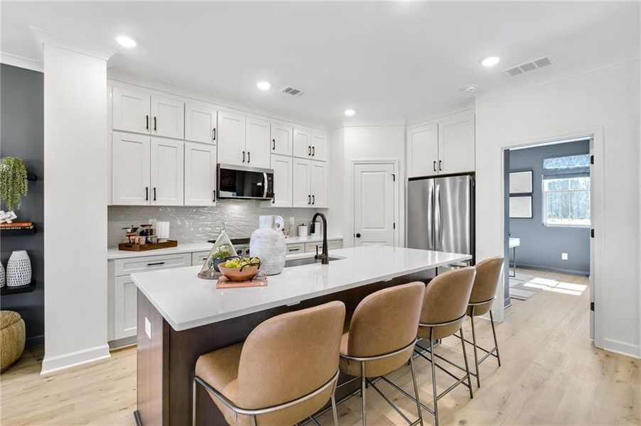 Furnished interior view inside a new home in The Village at River Green, Canton (Image 11).