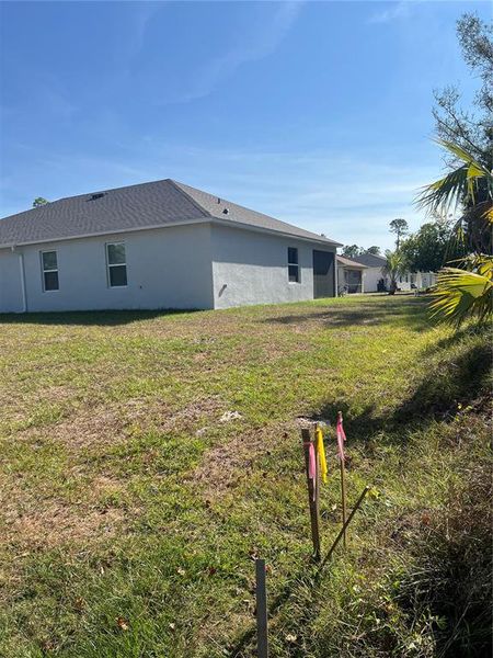 Exterior details and patio area of a home in , North Port (Image 25).