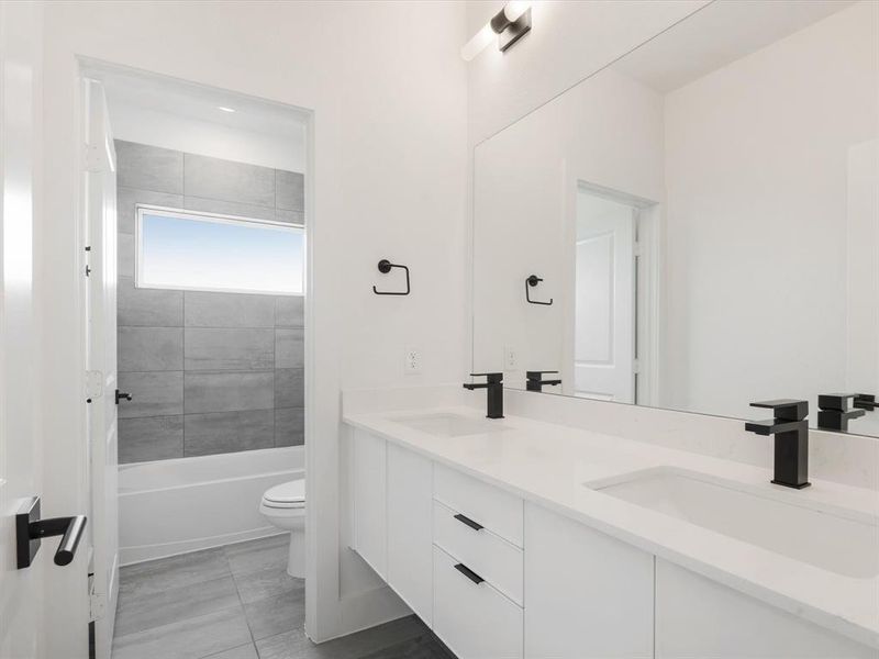 Furnished interior view inside a new home in Royal Court, Little Elm (Image 8).