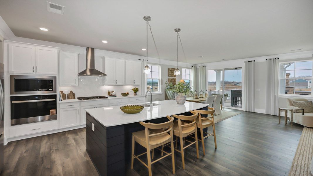 Representative furnished interior of a home built from the Harbor Oak by D.R. Horton in Lake Tide Summit, Chapin (Image 13).
