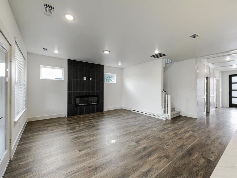 Family room with electric fireplace and recessed lighting Family room with electric fireplace and recessed lighting