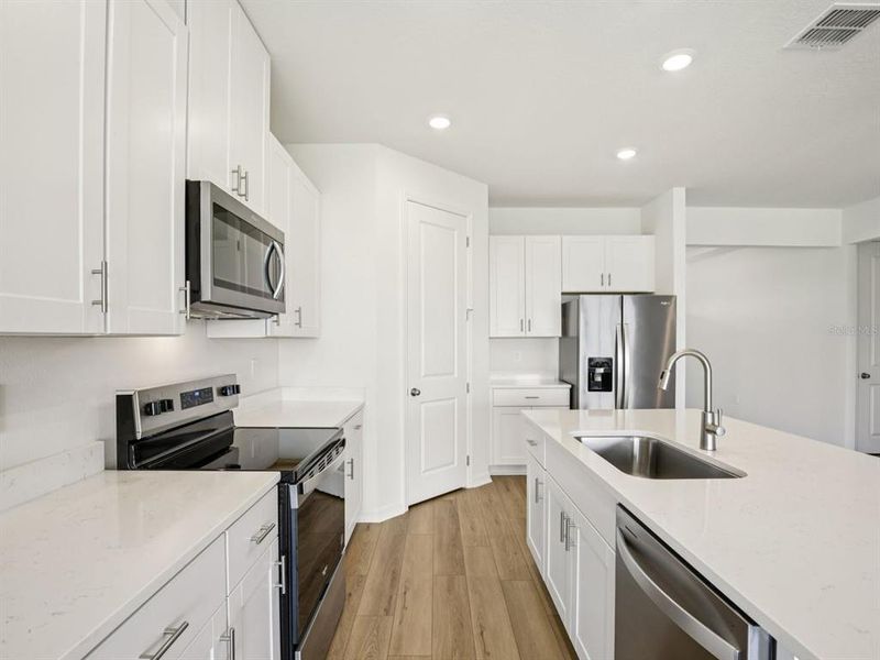 Furnished interior view inside a new home in Coasterra - Reserve Series, Palmetto (Image 7).