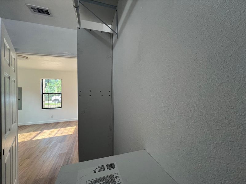 Hallway to living room from the left side of the home Hallway to living room from the left side of the home