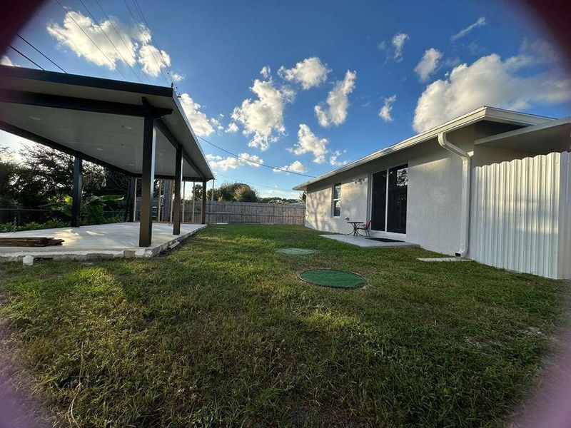 Exterior details and patio area of a home in , West Palm Beach (Image 22). Exterior details and patio area of a home in , West Palm Beach (Image 22).