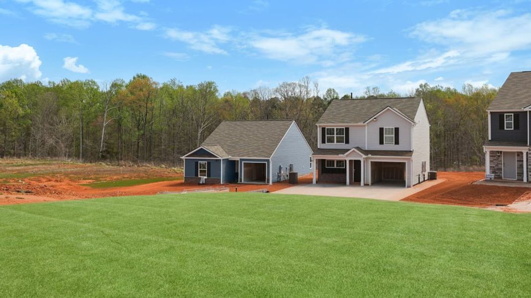 Front exterior of a new home in Waverly Station, Greenwood, SC, highlighting curb appeal (Image 20). Front exterior of a new home in Waverly Station, Greenwood, SC, highlighting curb appeal (Image 20).