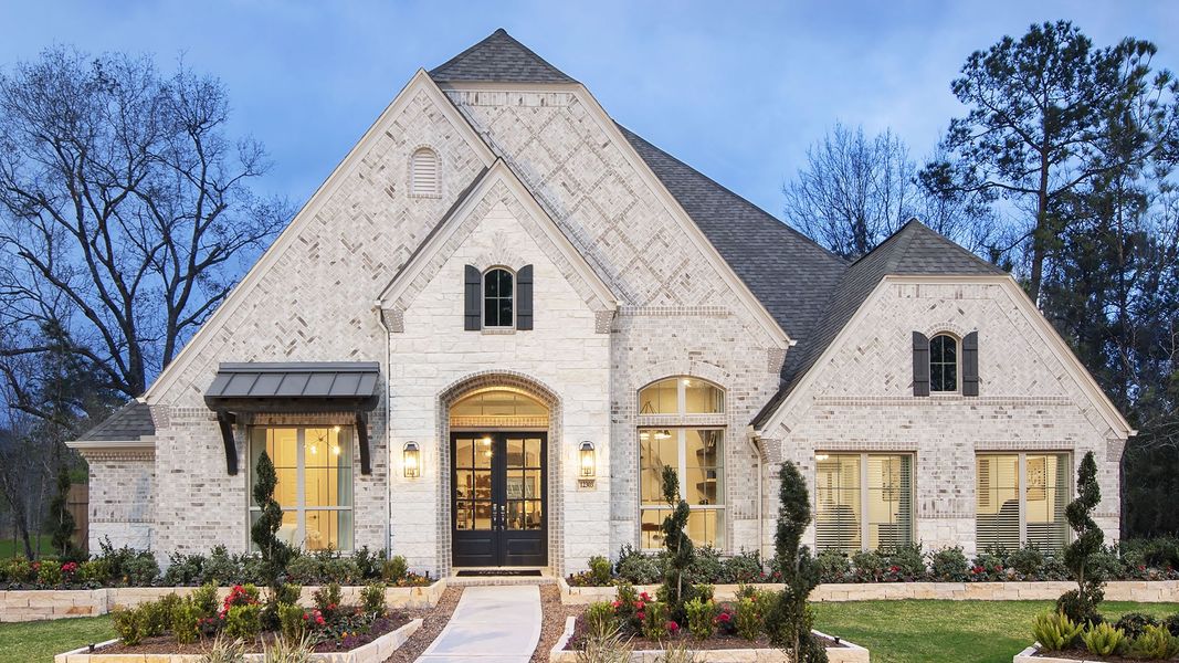 Representative exterior photo of a completed home built from the 3578W by Perry Homes in Lakes of Cane Island, Katy, TX (Image 24).