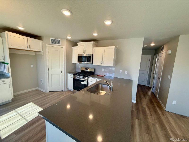 Furnished interior view inside a new home in Sky Ranch - Highland Collection, Watkins (Image 4). Furnished interior view inside a new home in Sky Ranch - Highland Collection, Watkins (Image 4).